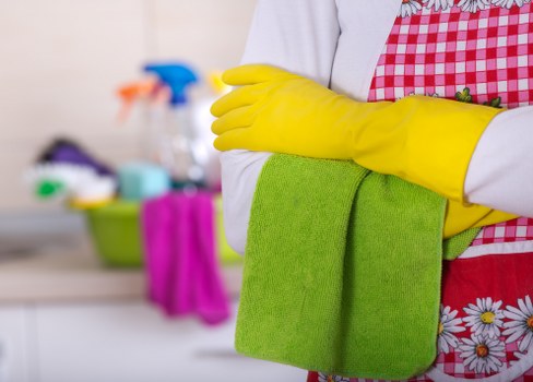 House cleaner using advanced equipment on vinyl floors